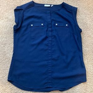 One navy and one teal NY and Company 100% polyester shirts with cap sleeves.